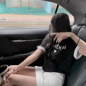 Short T-shirt and miniskirt